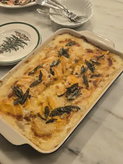 Butternut squash gratin with crispy fried sage leaves — comfort food elevated by Chef Mollie