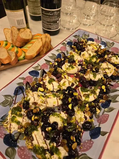Goat cheese and cherry board with pistachios and pesto — artisan grazing platter by Chef Mollie